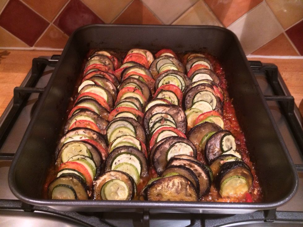After an hour of cooked uncovered the sauce at the bottom of the tray should be thick but not dry. If it's to dry add a little water and if it's to watery leave to cook a little longer.