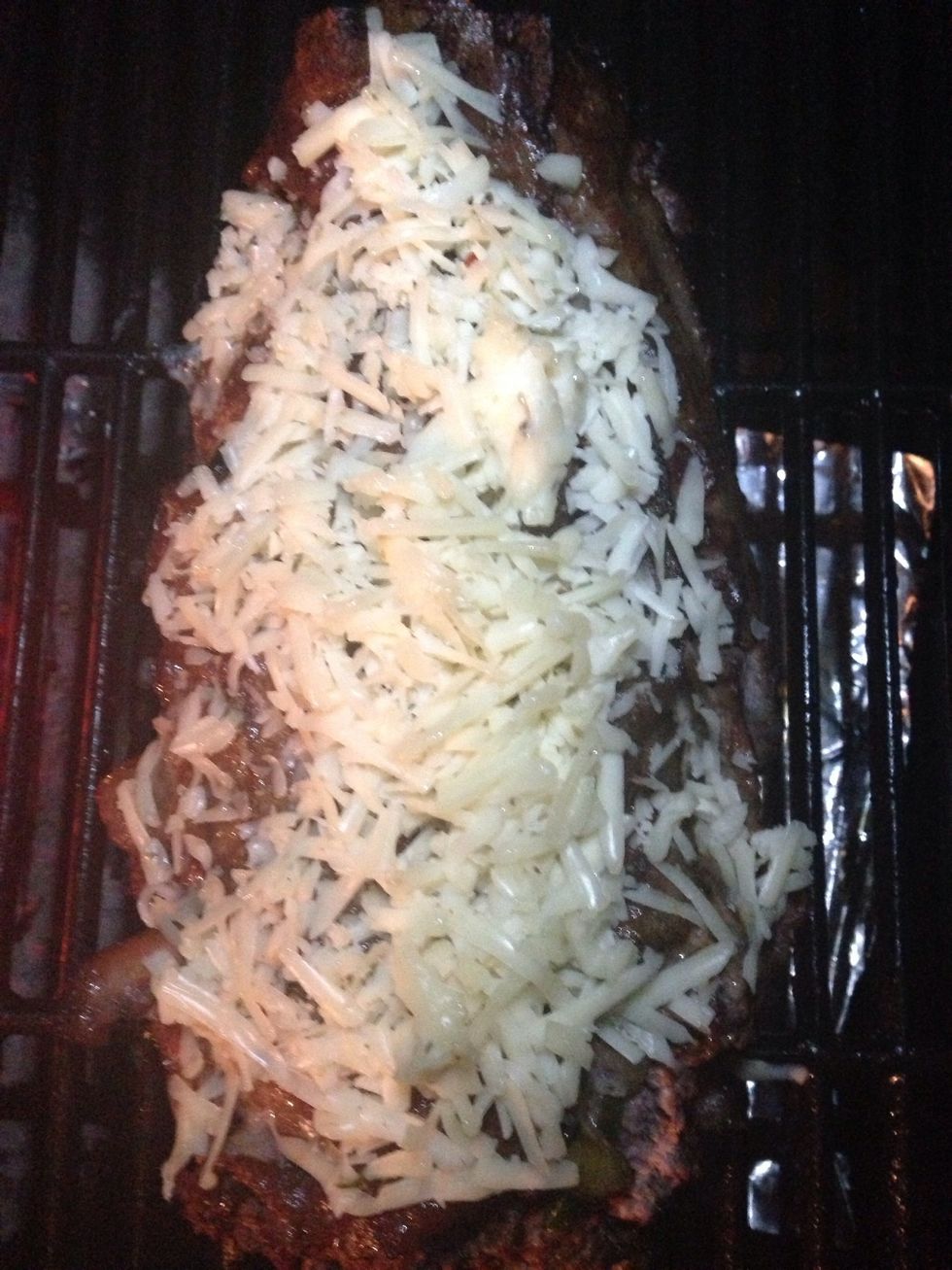 After an hour of cooking layer another helping of shredded pepper jack cheese. Cook for another 30 minutes.