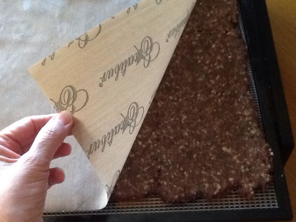 After an hour or two, flip over, remove para flex sheet, turn temperature down to 145\u00b0 and rescore with butter knife from back side.