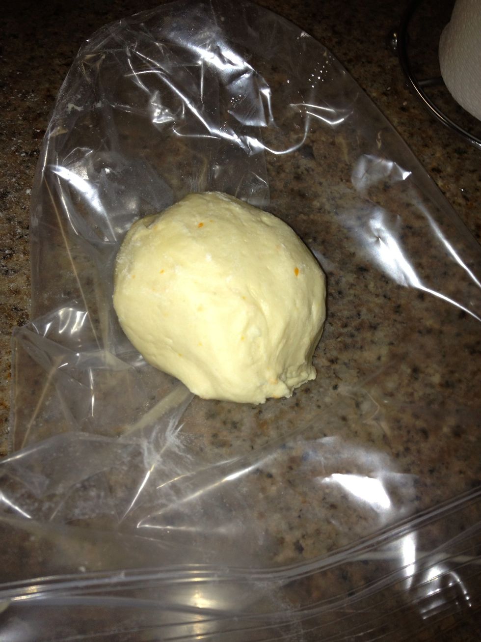 After an hour Remove dough and knead it around a bit cut dough in half work with one part at a time.