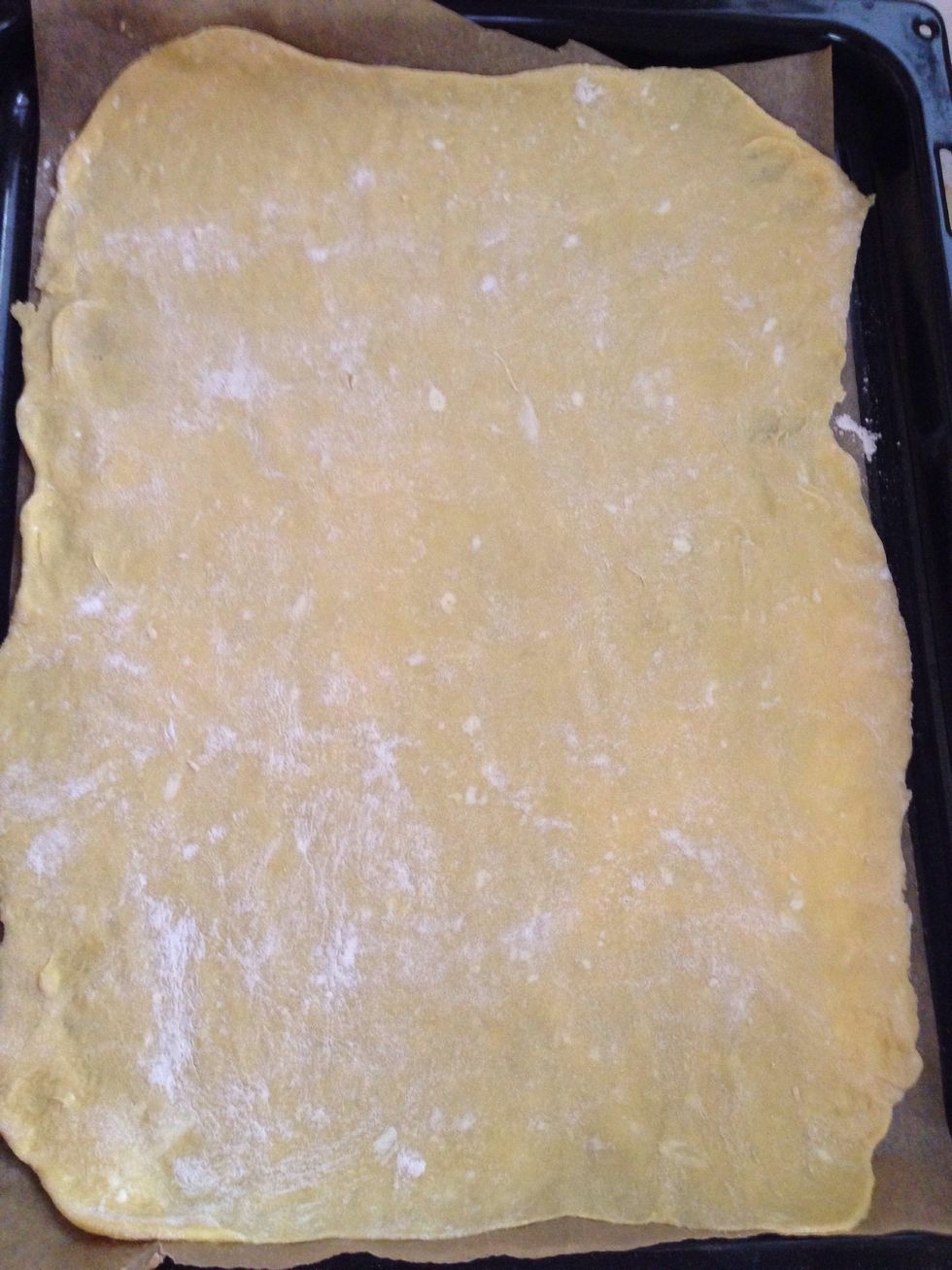 After an hour take out each piece and roll into a thin sheet. Bake in the 360C preheated oven for 5-7 minutes. Be very careful not to burn them.