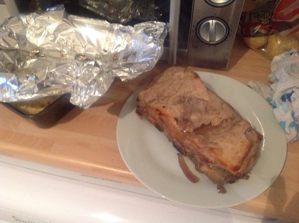 After another 45 minutes remove the meat from the oven and set aside under tinfoil to rest