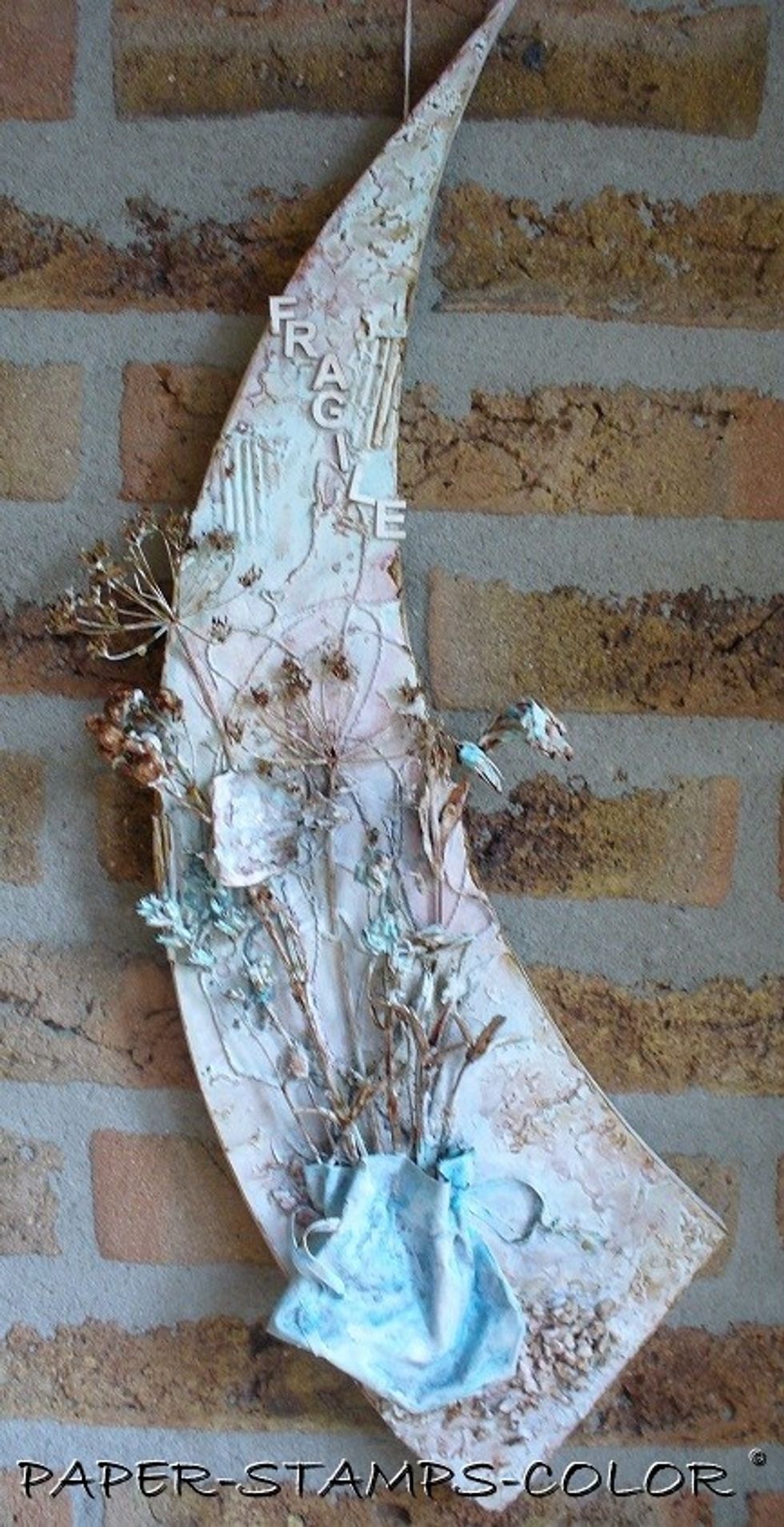 After assembling the letters, I added Sorbet Chocolate to parts of the stems and flowers, and the edges of the project, and between the 'stones' at the bottom, and also added it to the cracks.