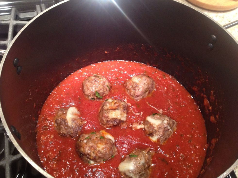 After baking, I threw meatballs in store bought pasta sauce and let everything simmer together a while.