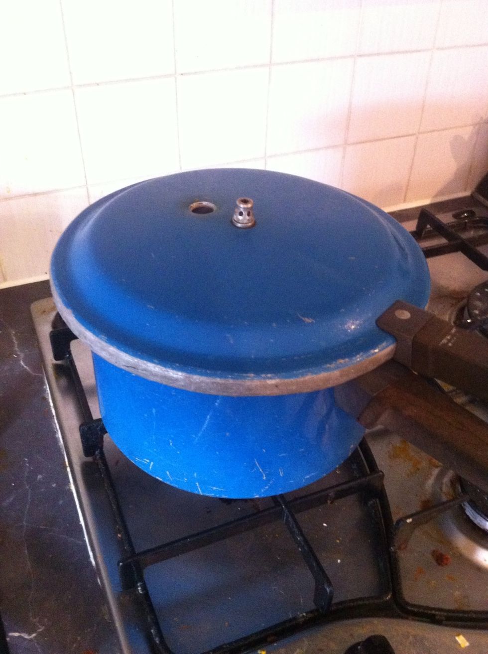 After being brought to boil, place lid onto pot, turn down heat and allow to simmer for 25 to 30 mins
