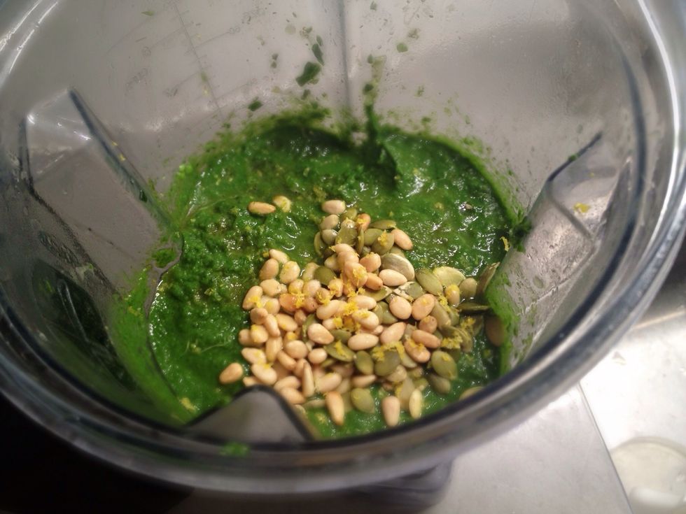 After blending the veggies on high add pine nuts and pumpkin seeds. If you don't have both-- either one is fine. You can buy small amounts from grocery stores that sell bulk seeds and nuts