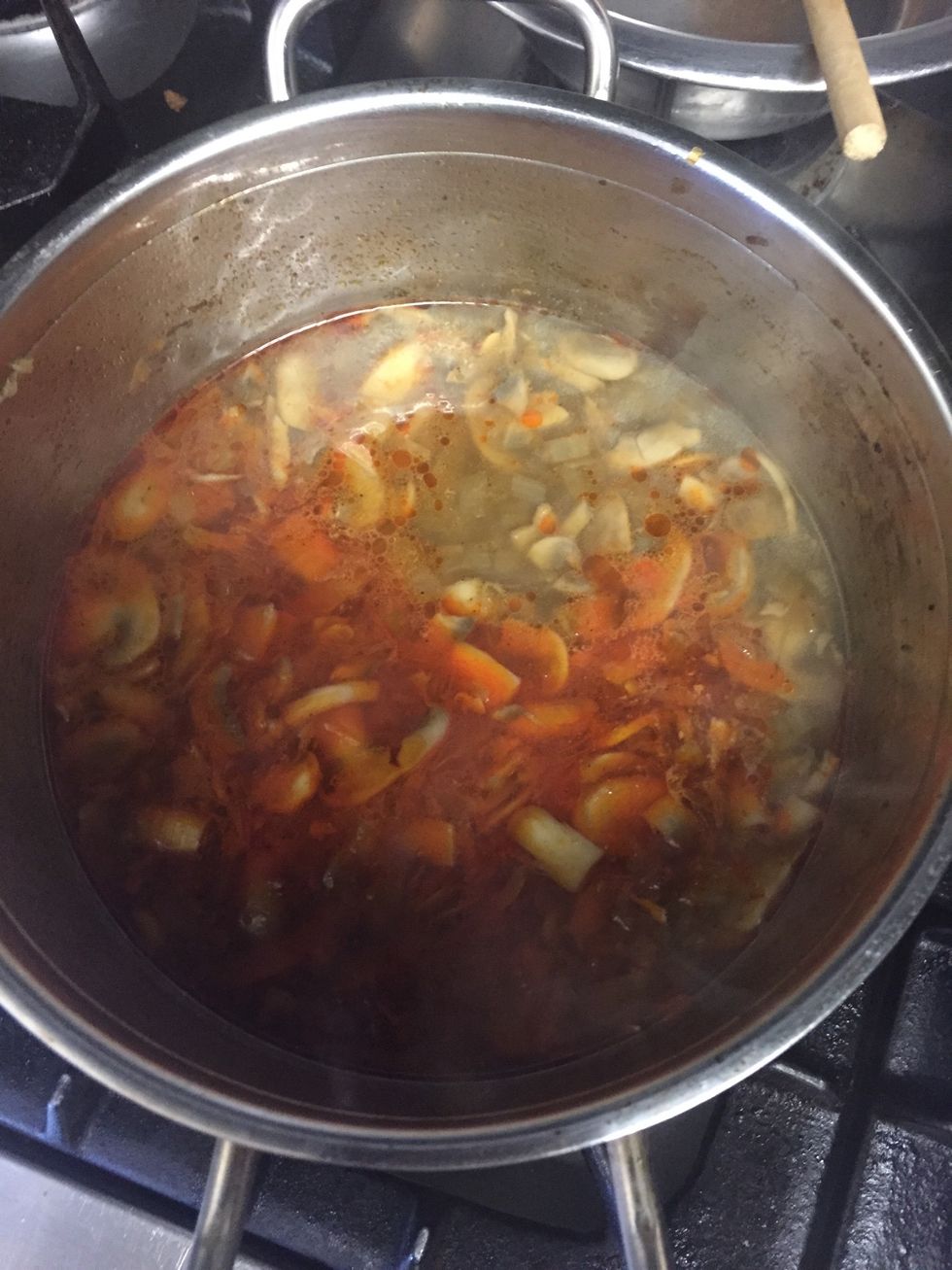 After boiling the soup for about 15-20min, take it off the heat. That's when you add the sour cream-flour mixture.