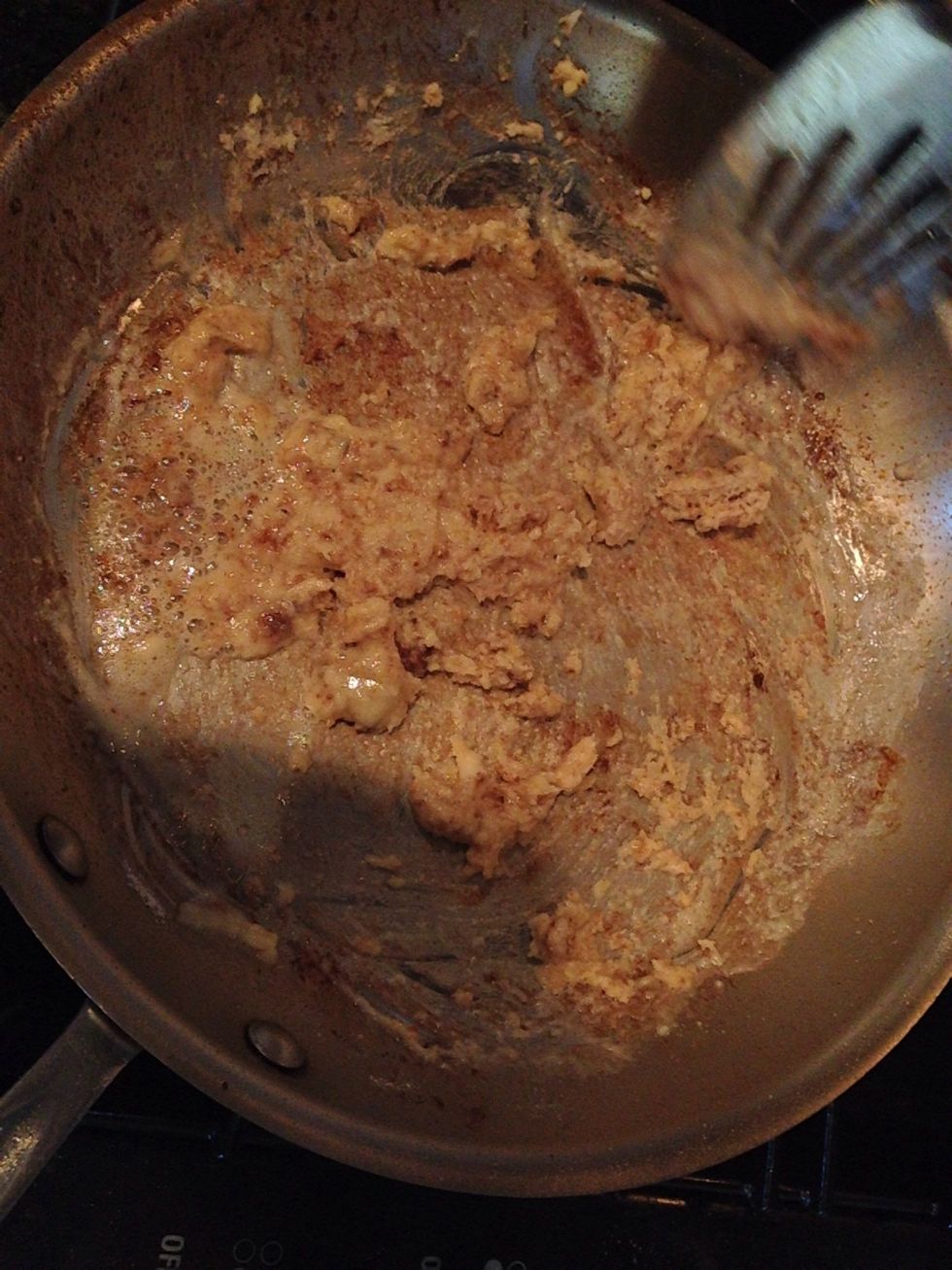 After browning the meat, add the flour and olive oil to the pan. Cook the roux approximately 3 minutes.