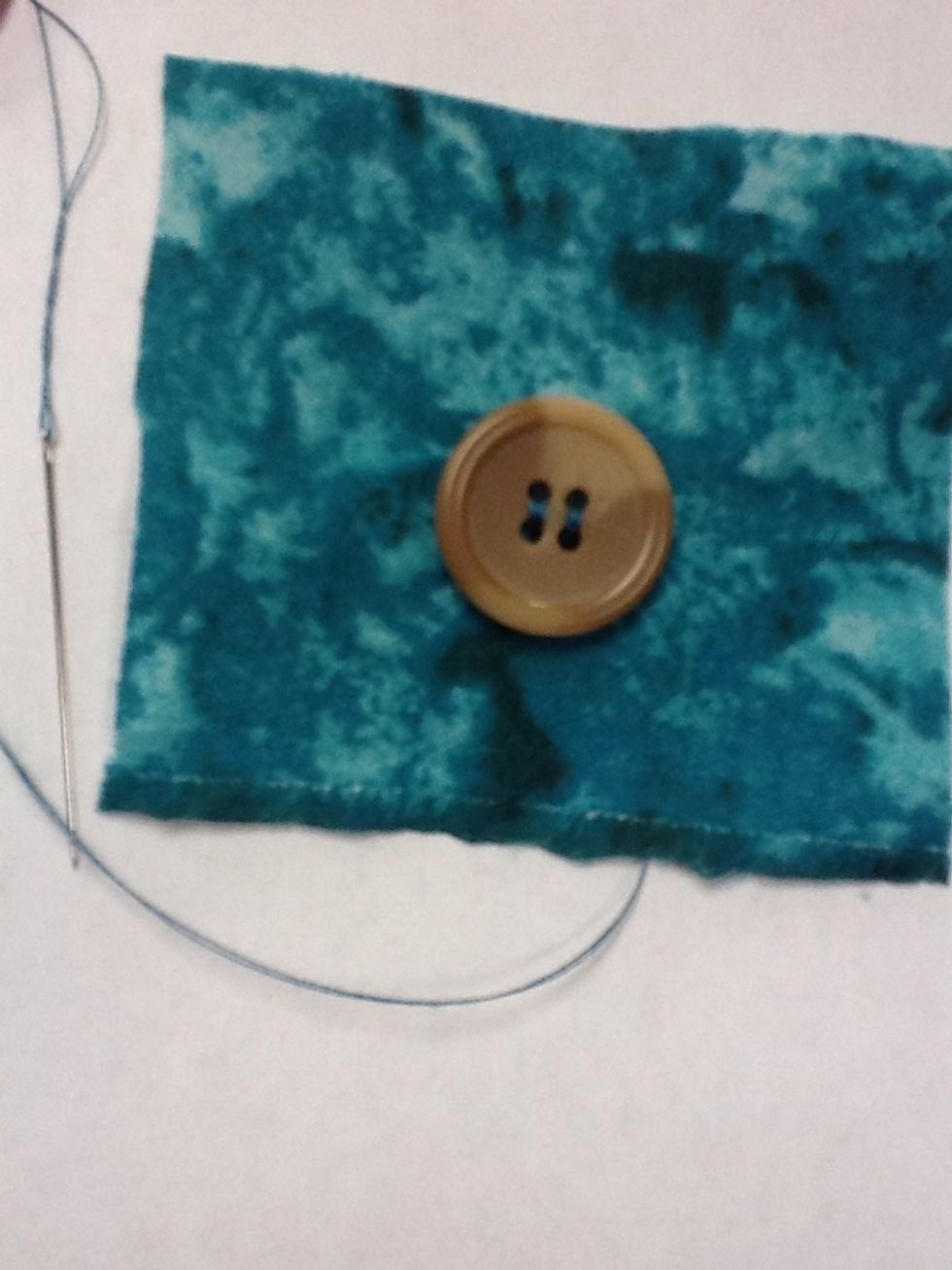 After button is secure- make sure you end on the backside of the fabric.
