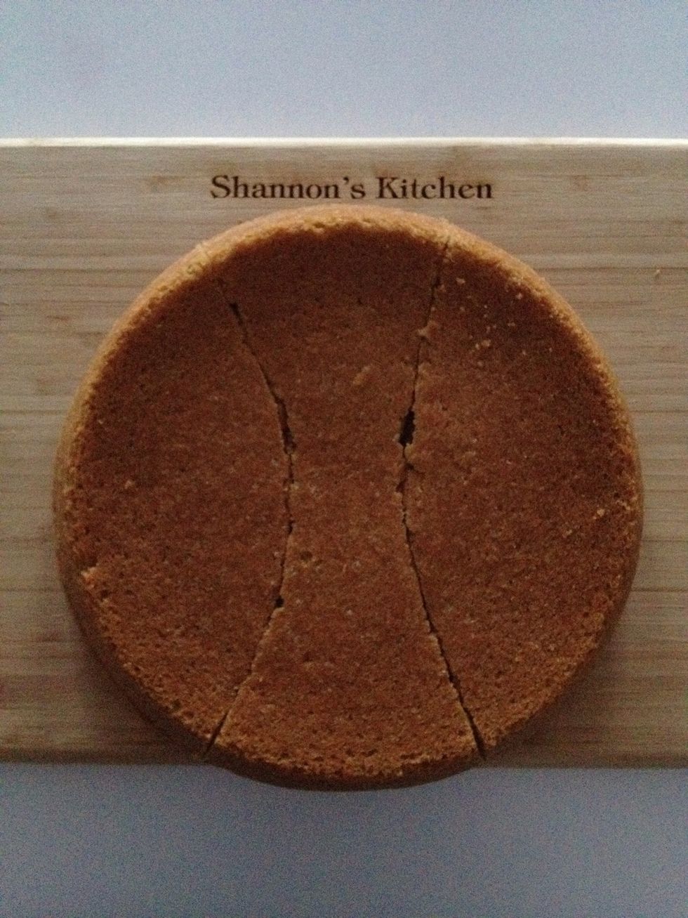 After cakes have chilled, choose one to cut into ears and a bow tie.  Make two cuts as shown.