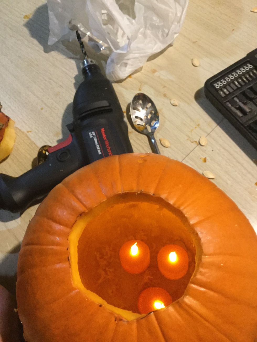 After carving your pumpkin put in your little lights.