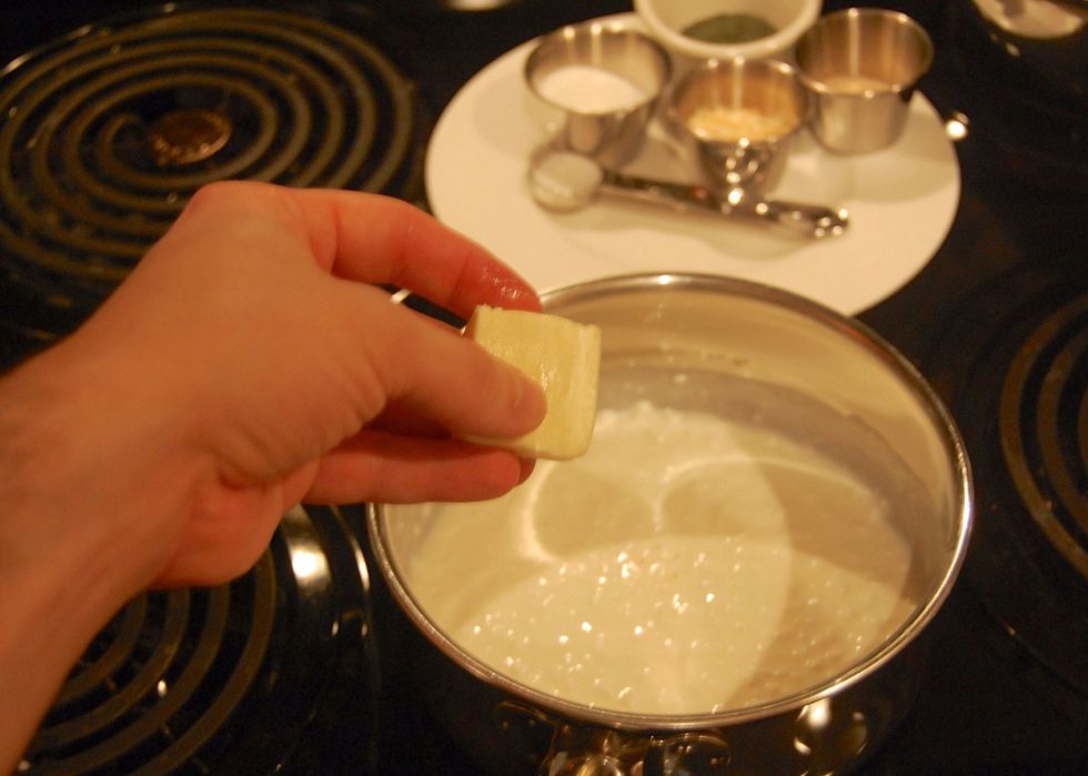 After cheese reaches 110 degrees, turn off heat, add the butter.