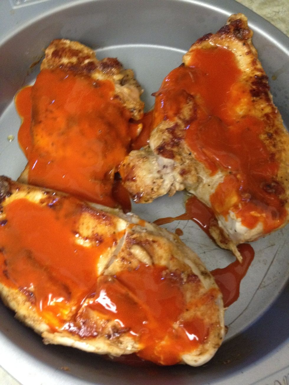 after chicken is cooked, lightly cover with frank's hot sauce.