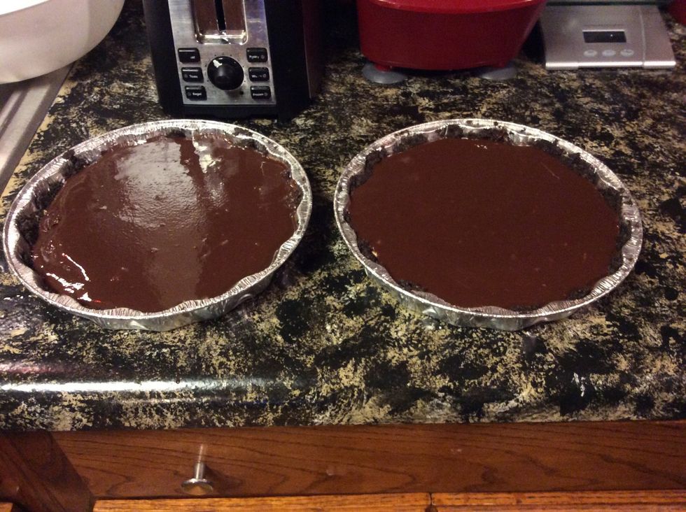 After chocolate is spread on both pies.