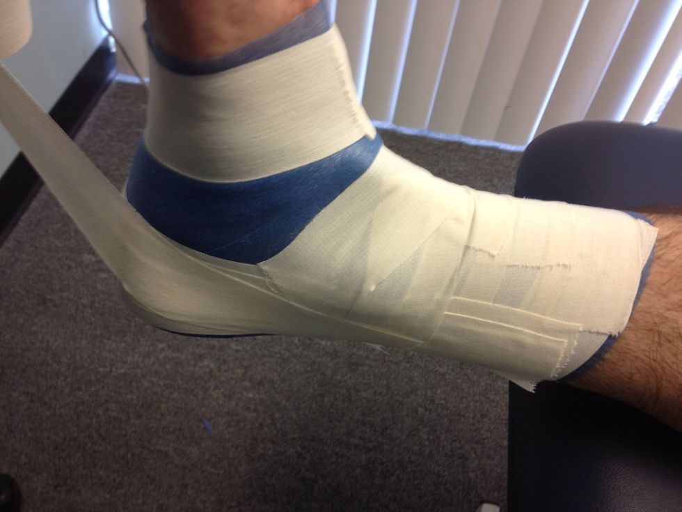 After completing a minimum of 3 stirrups begin figure 8 or figure 4 strips. Start inside leg wrap under and around the front of the foot continue around the leg and end at the starting point.