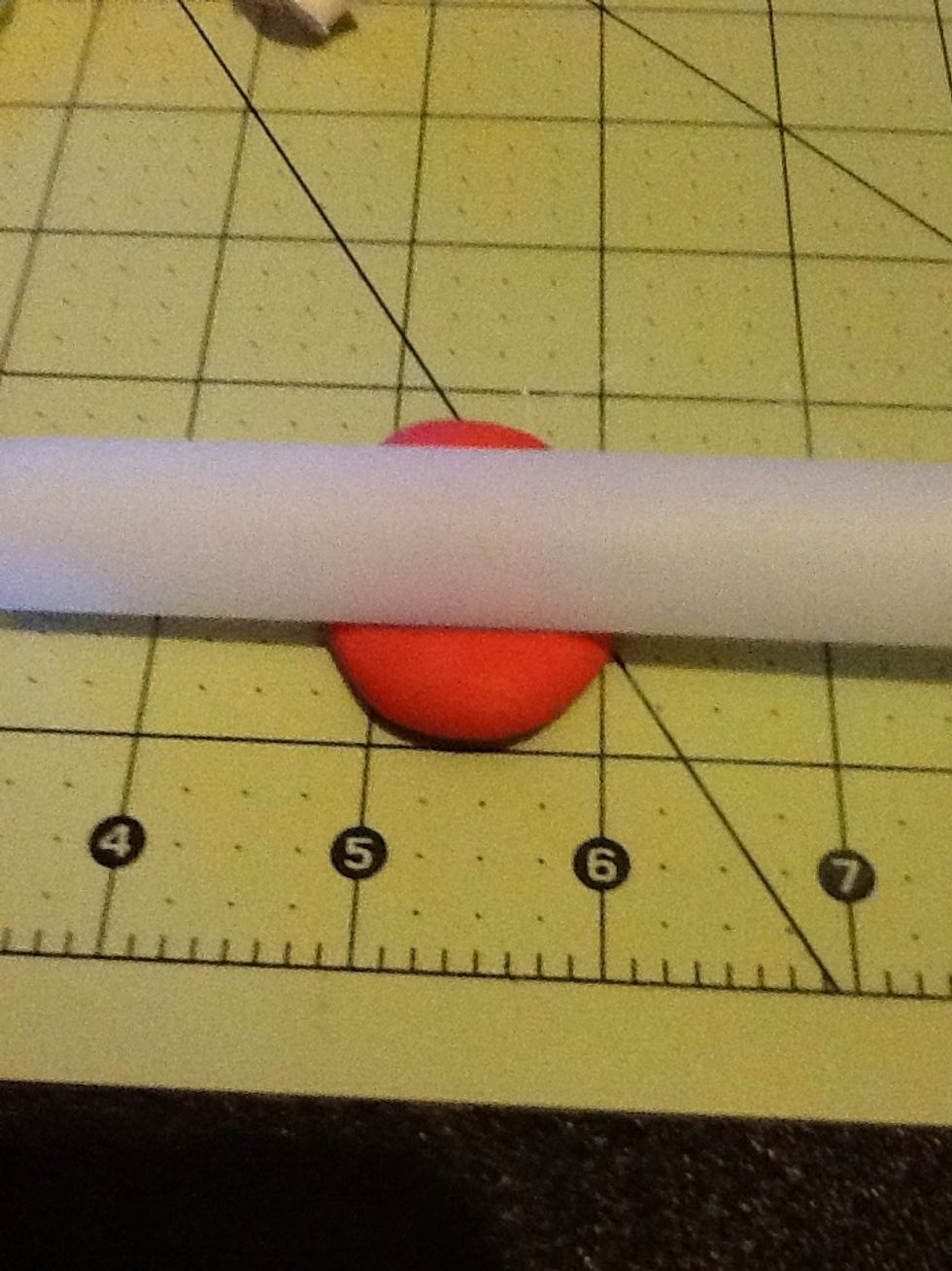 After conditioning roll out the clay with the roller or anything cylindrical until its a pretty good thickness or thinness you can work with.