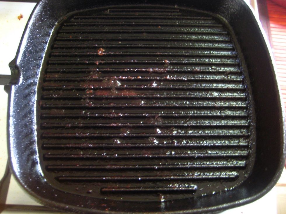 After cooking meat and left with a dirty, greasy grill pan......drain off the excess grease and allow it to be hot if it was already cold.