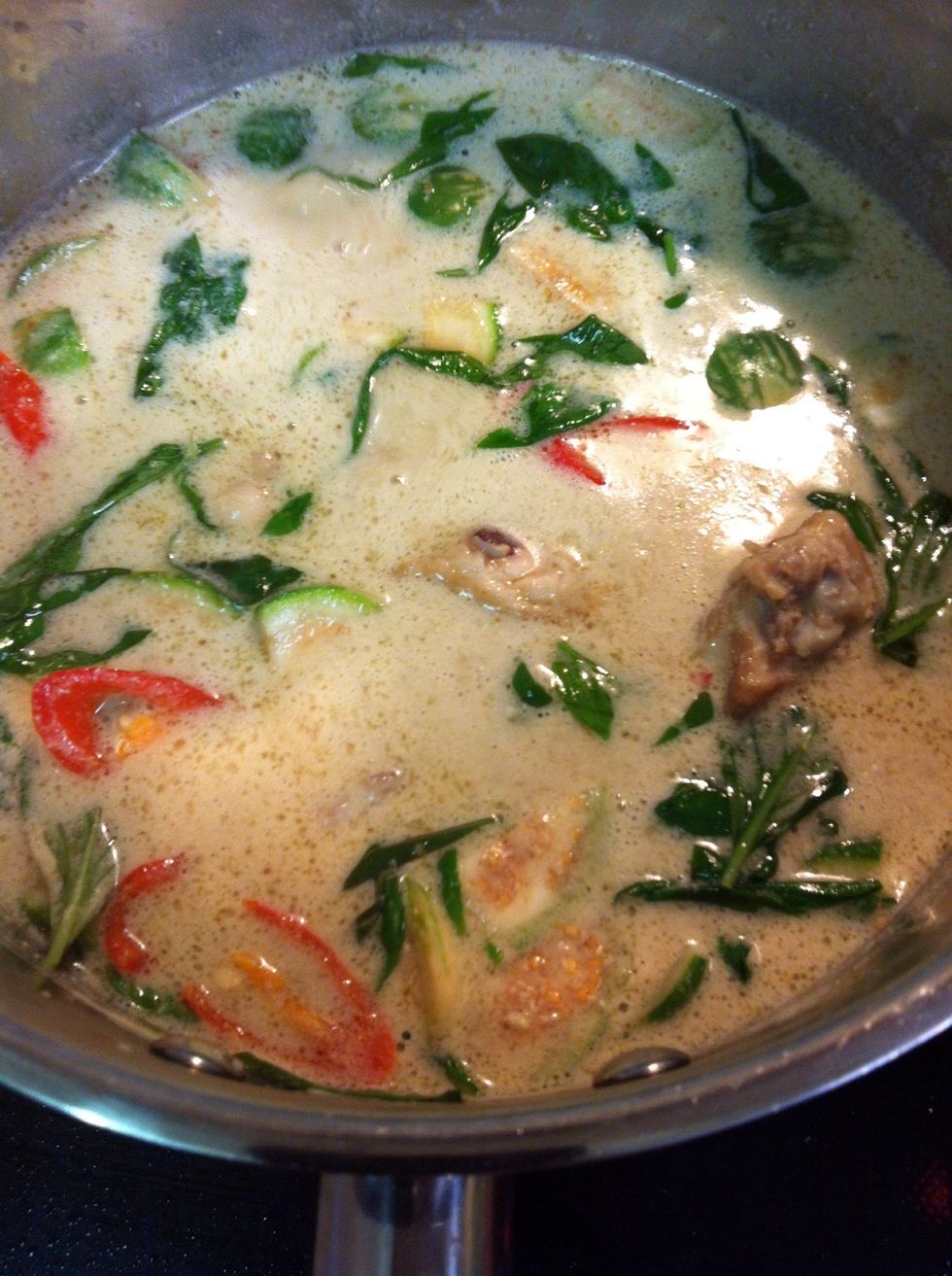 After curry is cooked then add your eggplants , basil , chili Mixed then together turn off the stove