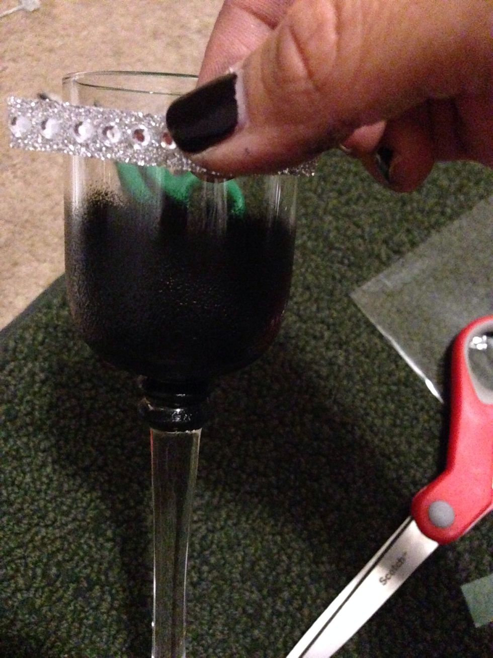 After cutting my "bling" I place it as close to the rim of the tealight as possible