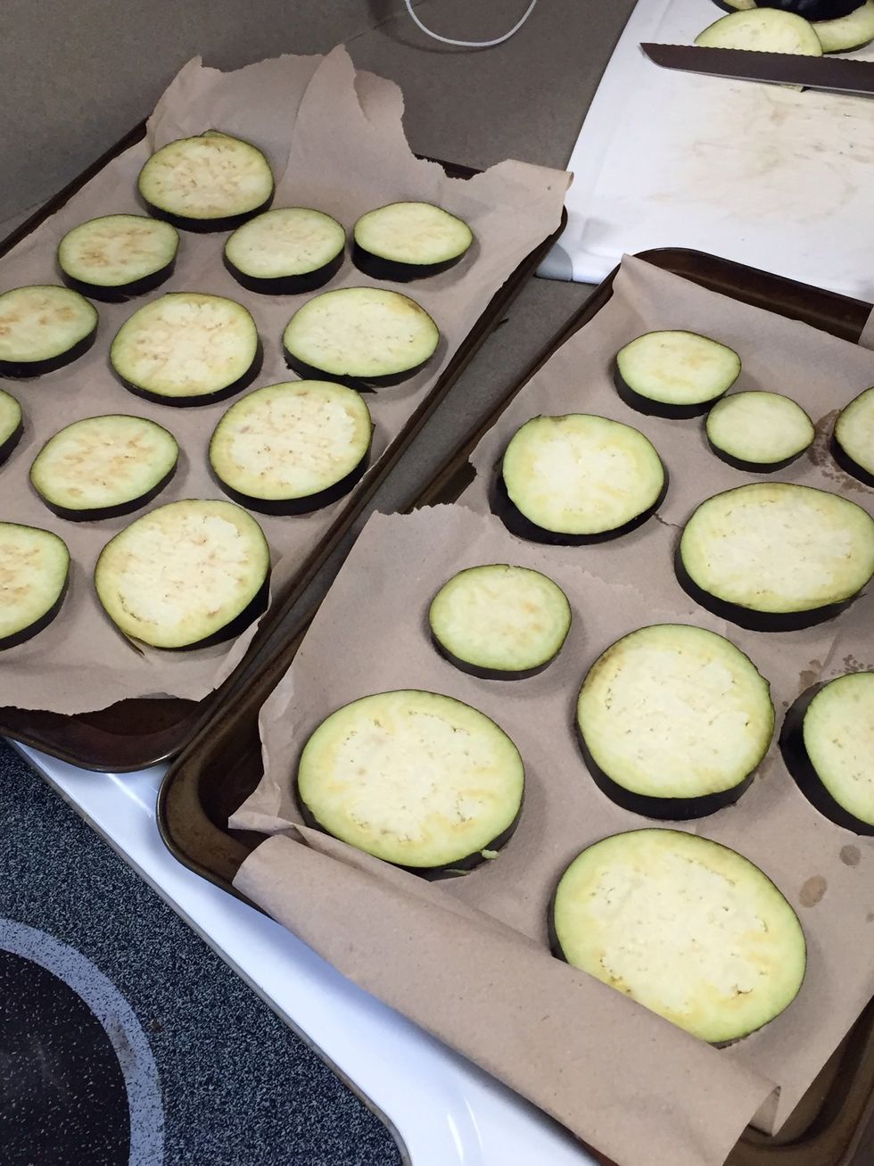 After cutting the eggplant lay them on a pan lined with paper towels