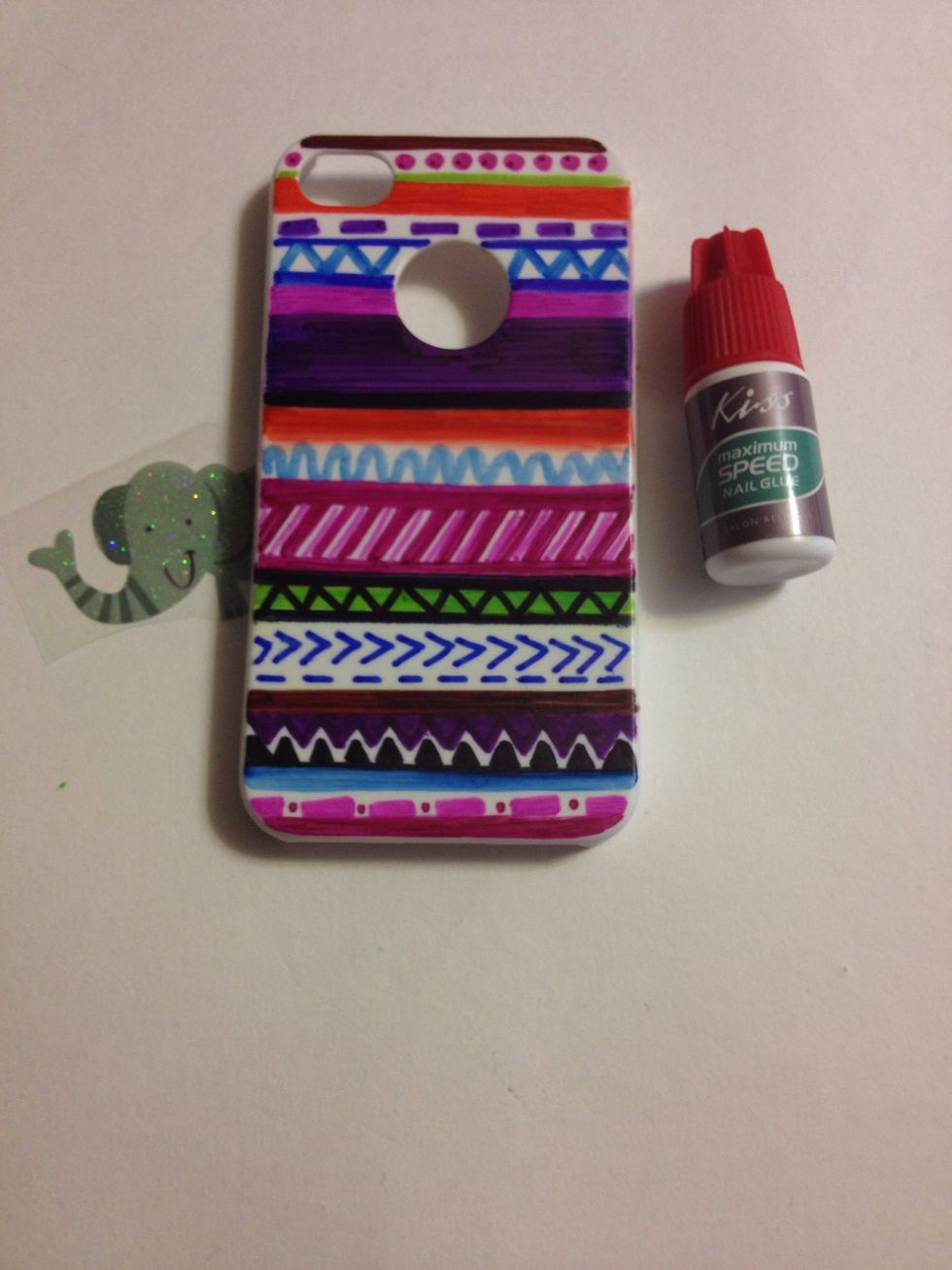 After designing it, I'm now going to add the elephant sticker.