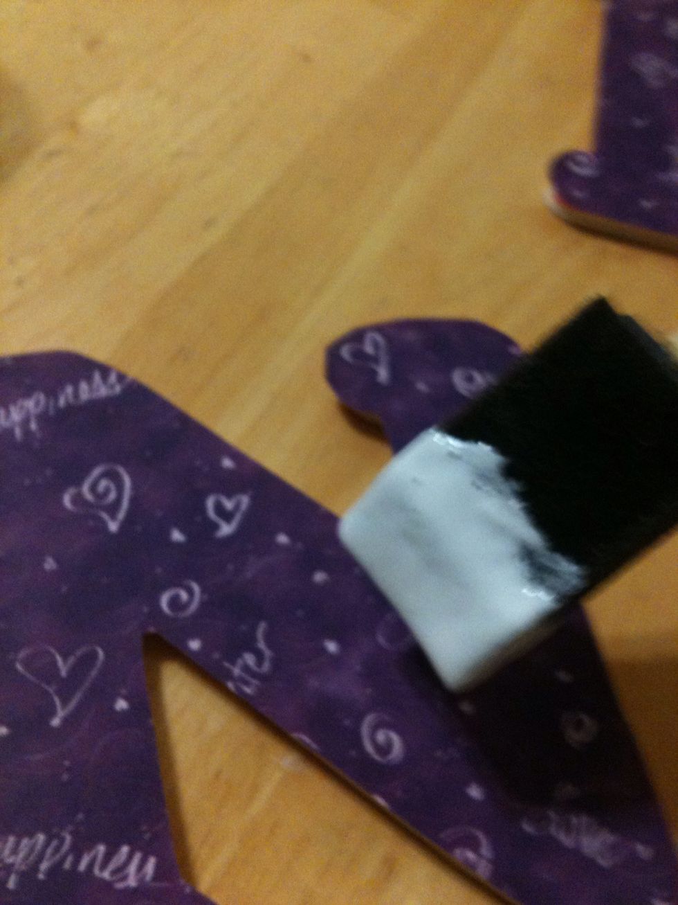 After done drying, paint a thin layer of mod Podge on top of paper.