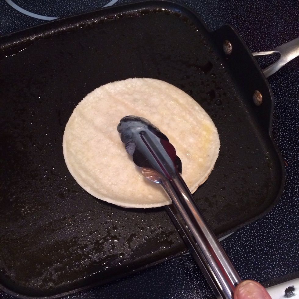 After downside becomes browned flip with cooking tongs.