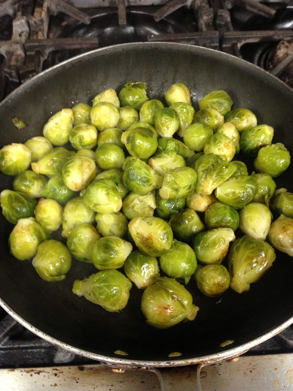 After draining them, Next take a pan and bacon fat and saut\u00e9 them to bring them back up to temp then set aside