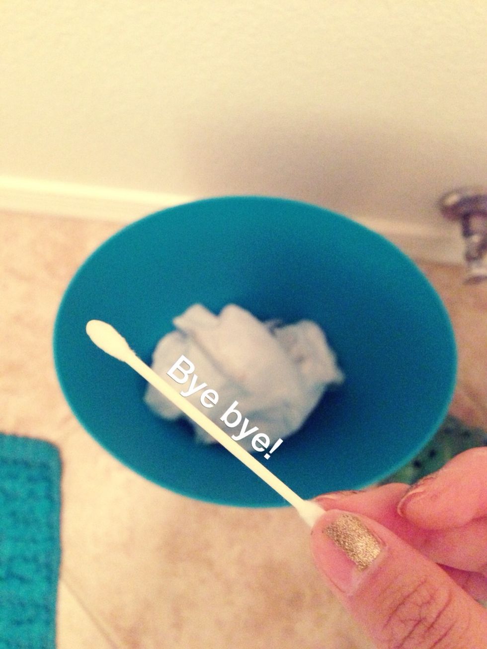 After drying off the belly button , you can throw out your dirty q-tip and say bye . Use a clean q-tip every time you clean it obviously .