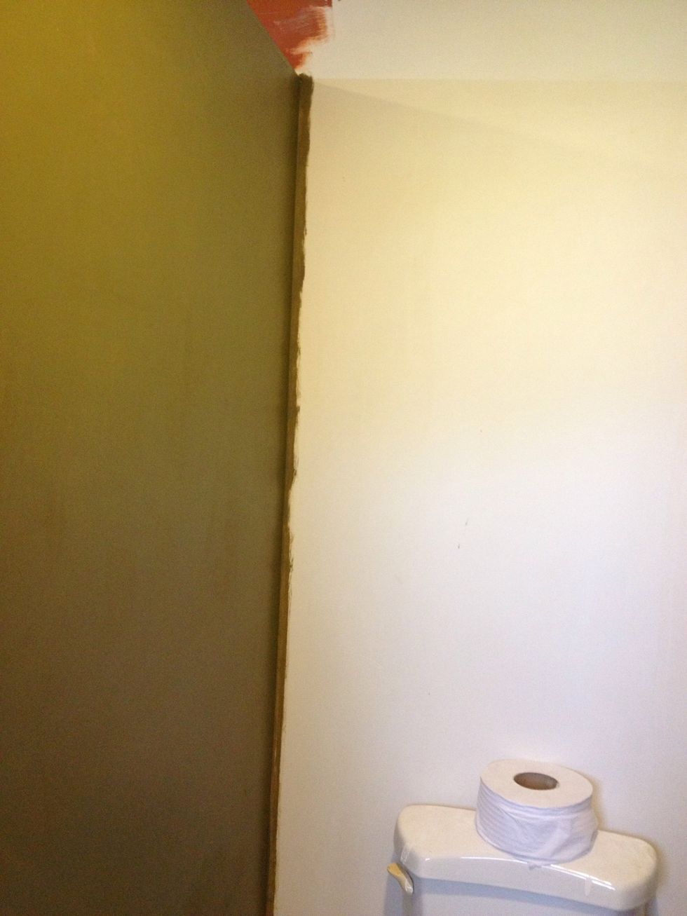 After drywall & sanding is done & the wall is free of all dust, What I do when I'm painting with 2 colors (2 tone), is to paint the first color a bit over the corner to make sure the corner is filled.