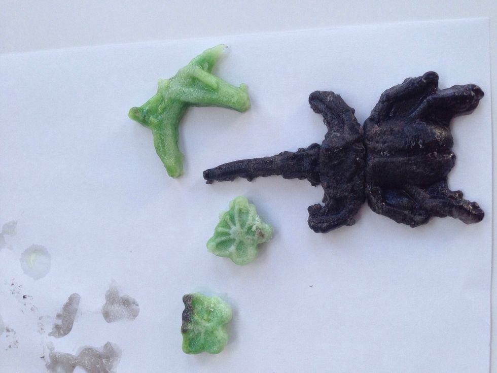 After edges are loosened, pry gummies out