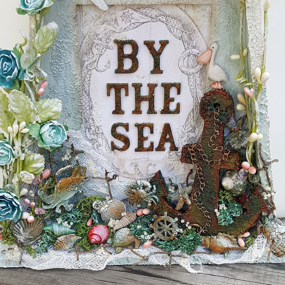 after embellishing, lightly drybrush some gesso throughout