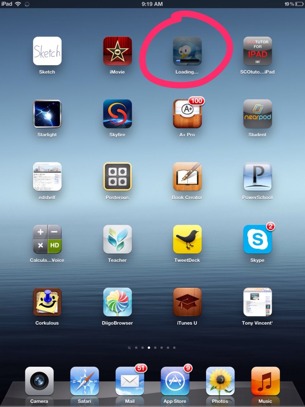 After entering the Apple ID it will return you to an app screen and it will show the process of apps that are currently updating.