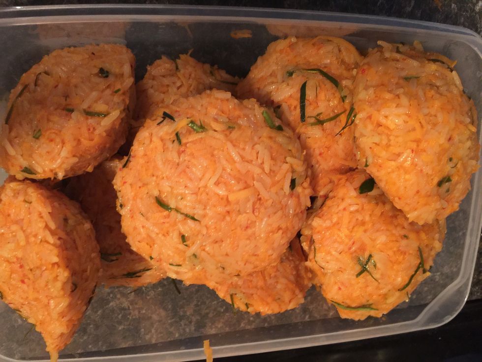 After everything is all mixed, make balls of rice by hand. Make them as tight as possible so they don't fall apart while frying.