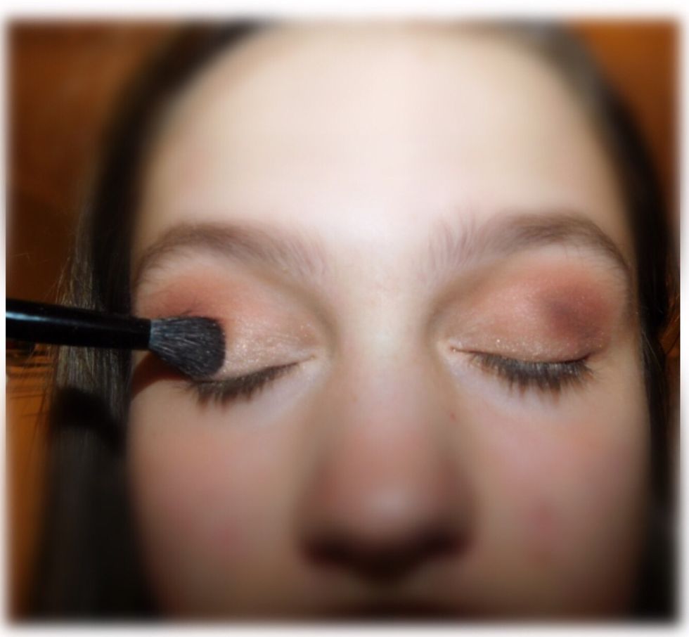 After finishing that, take a shimmery/metallic color, and put on the lid, and blend into the lid so its not too bright.