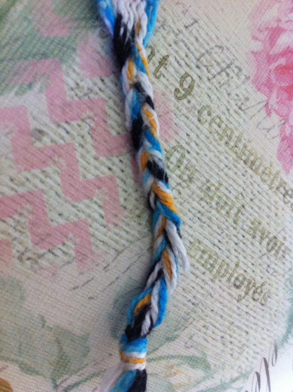 After finishing the bracelet, I braid both ends then secure with a knot. Option 1: tie around wrist. Option 2: make an adjustable knot.