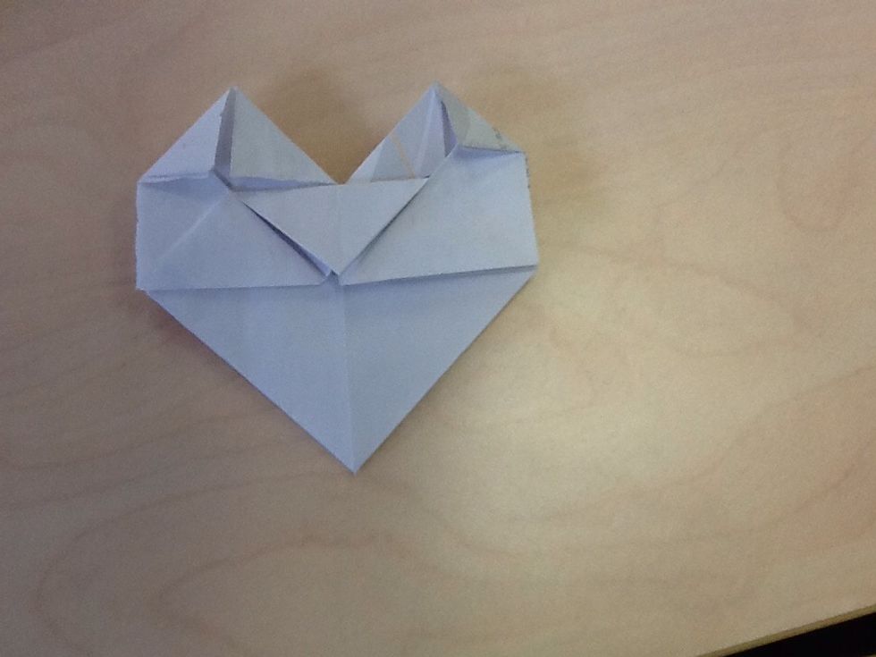 After, fold the two sides paper in triangle, all the sides.
