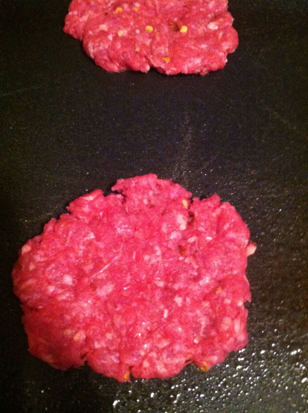 After folding the ingredients into the patty, put on the skillet.