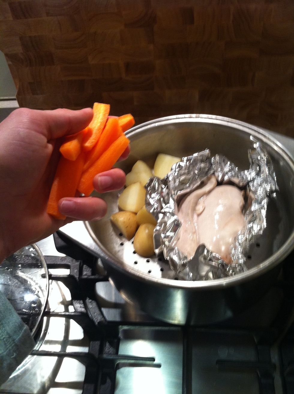 After four minutes or so, add your veg, I use carrots, they take about 6 minutes. At this point you can really leave it as long as you need, as, with chicken, better safe than sorry