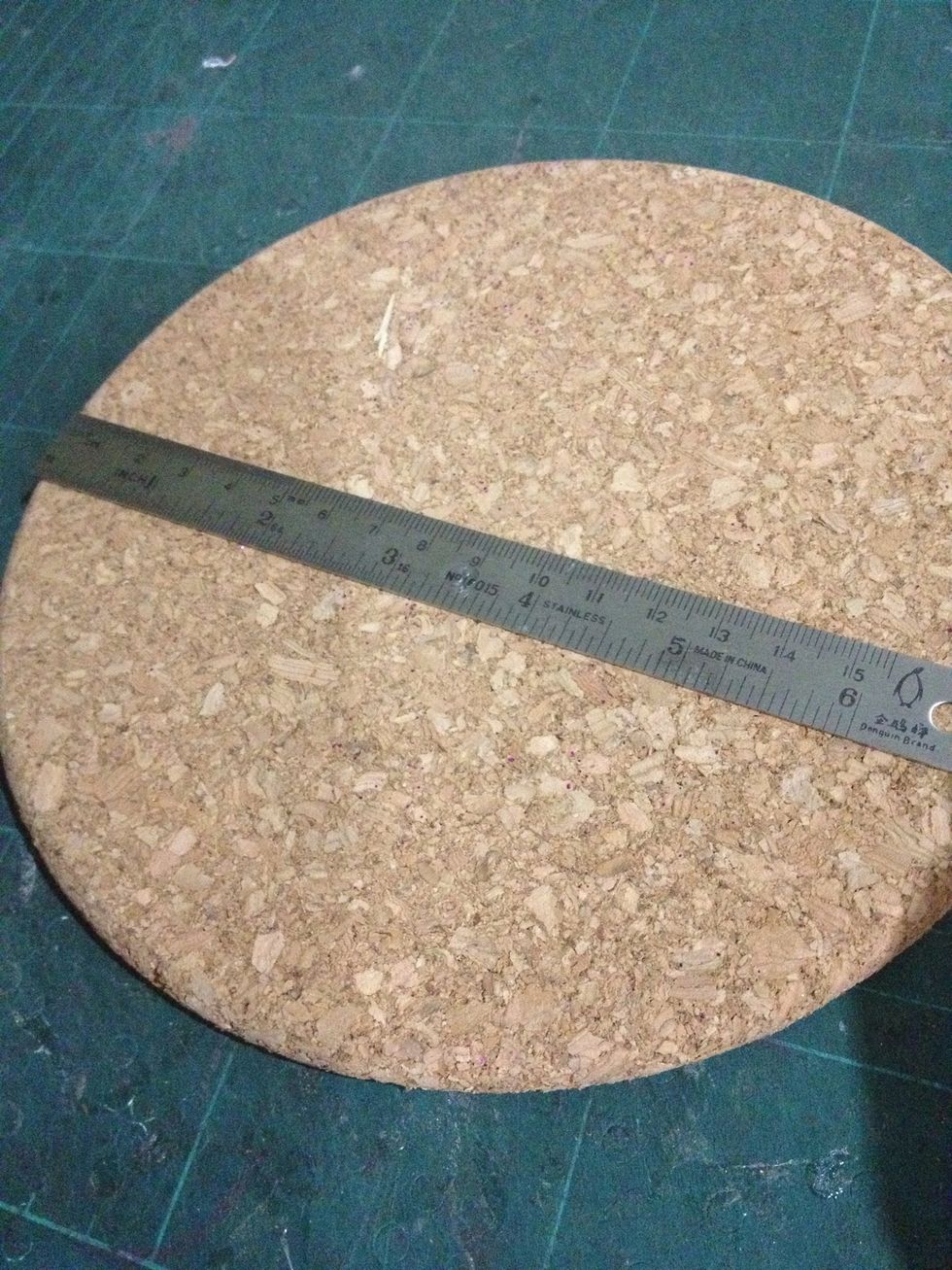 After gathering all the materials, measure the diameter of the cork board and divide into two, and minus 1.5-2cm.