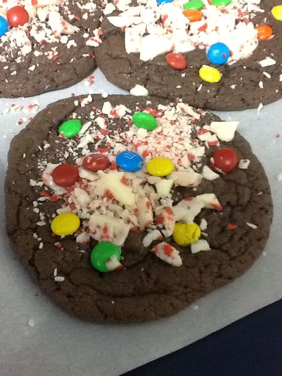 After getting your cookies right out of the oven, make sure to put the kisses and m&ms on fast.