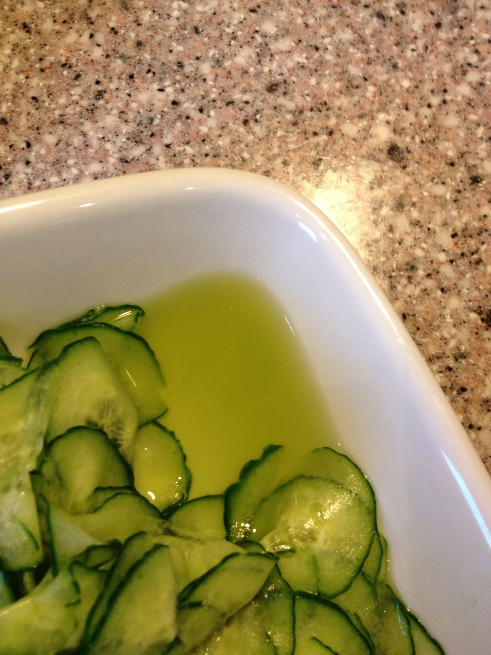 After half an hour the sugar have drawn liquid from the cucumber