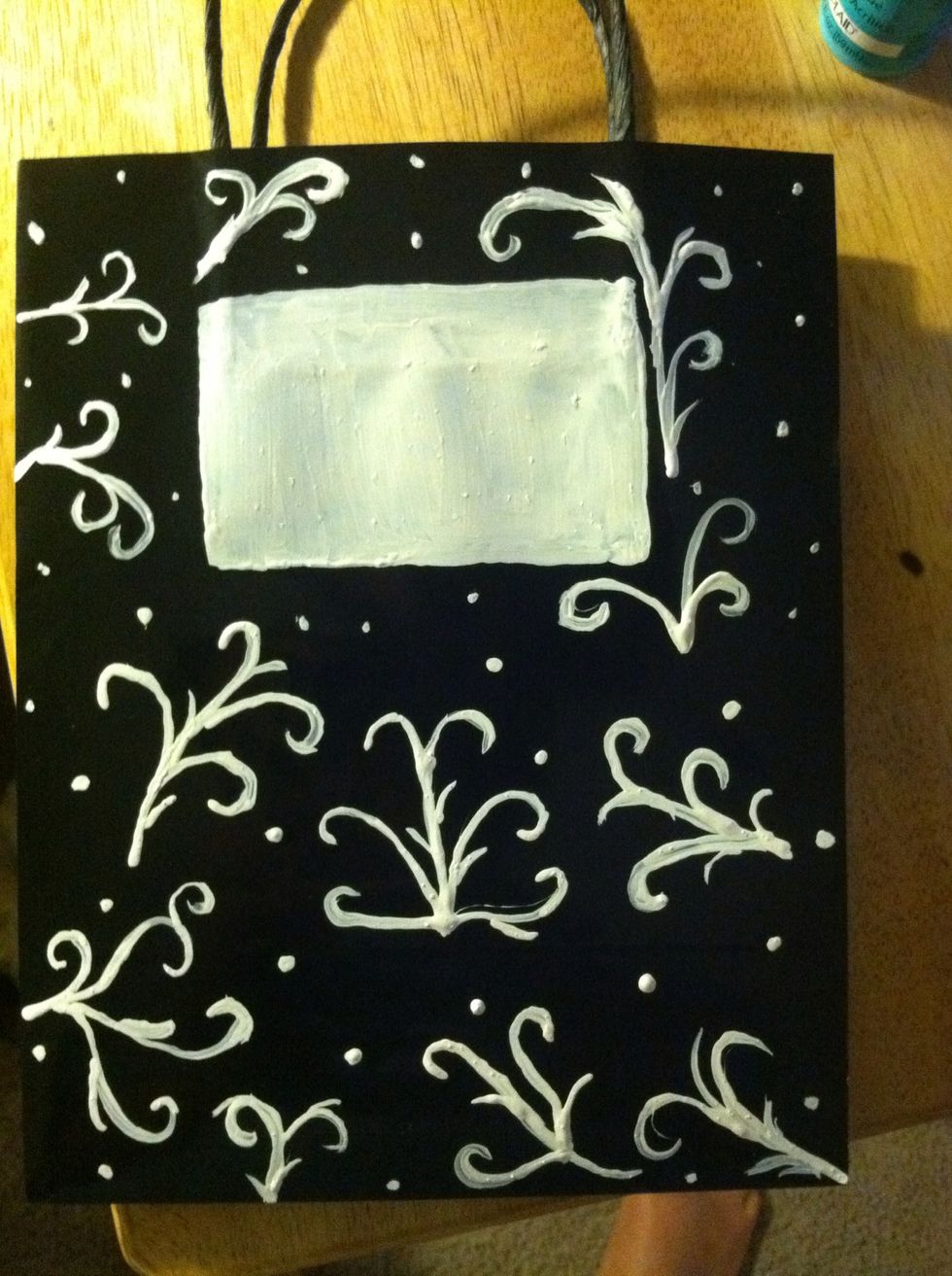 After I did the square I finished the rest of the bag front. Let it dry for a few minutes so you can paint over the white.