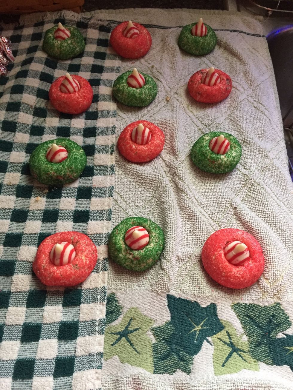 After I left my cookies cool, I placed a Hershey Kiss in the middle of each cookie.