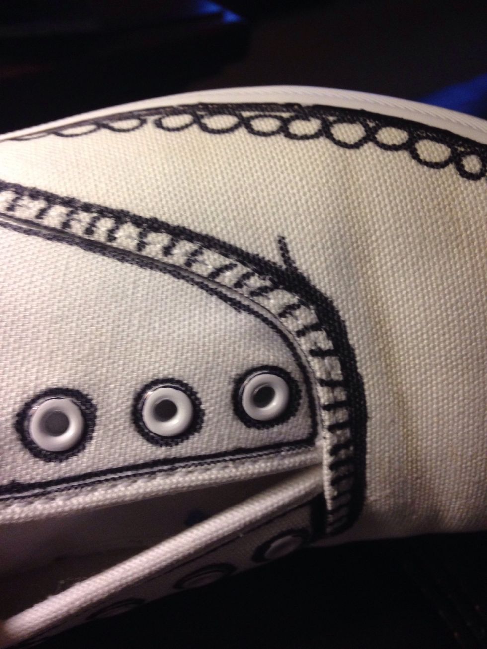 After I outlined most of the seams I began to add patterns.  I was distracted while drawing a line and oops!