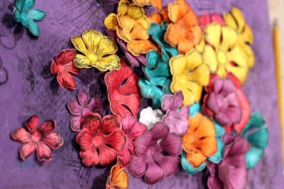 After I stamping and cutting a bunch of flowers using the Heartfelt Set, I used the tip of my paint brush to form and fluff my flowers.