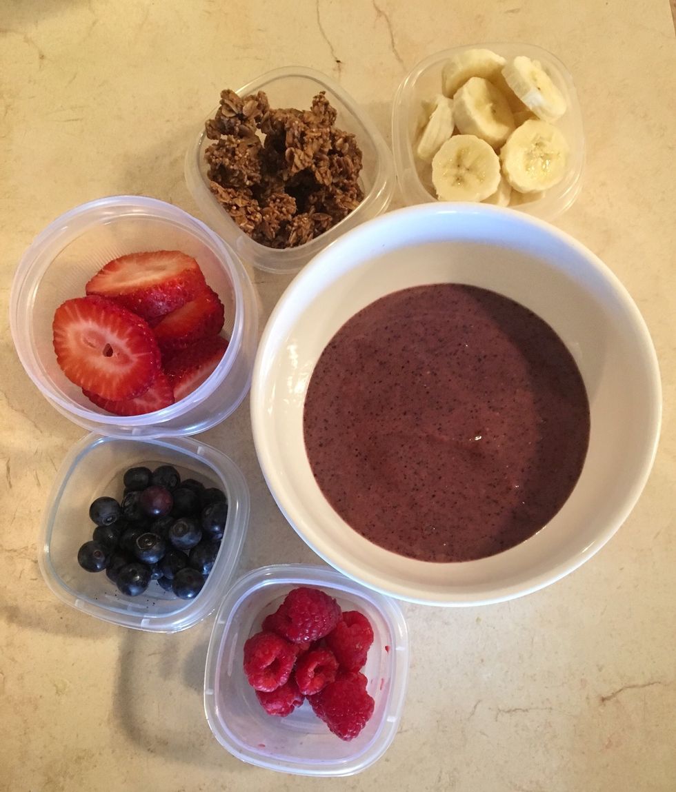 After ingredients are blended poor into a bowl. Then decorate for you final product. For my decorations I used, chopped bananas, granola, sliced strawberries, blueberries, and raspberries.