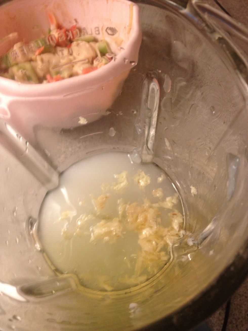 After it cool down put it on the mixer add garlic , oil , Lemon juice , and salt  and turn on should looks like the next pic