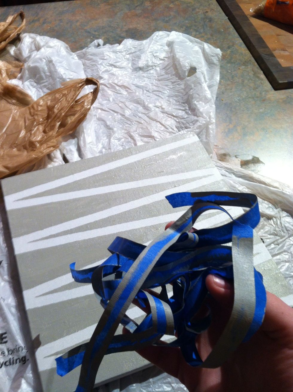 After it dries, remove tape carefully and make any necessary touch ups.