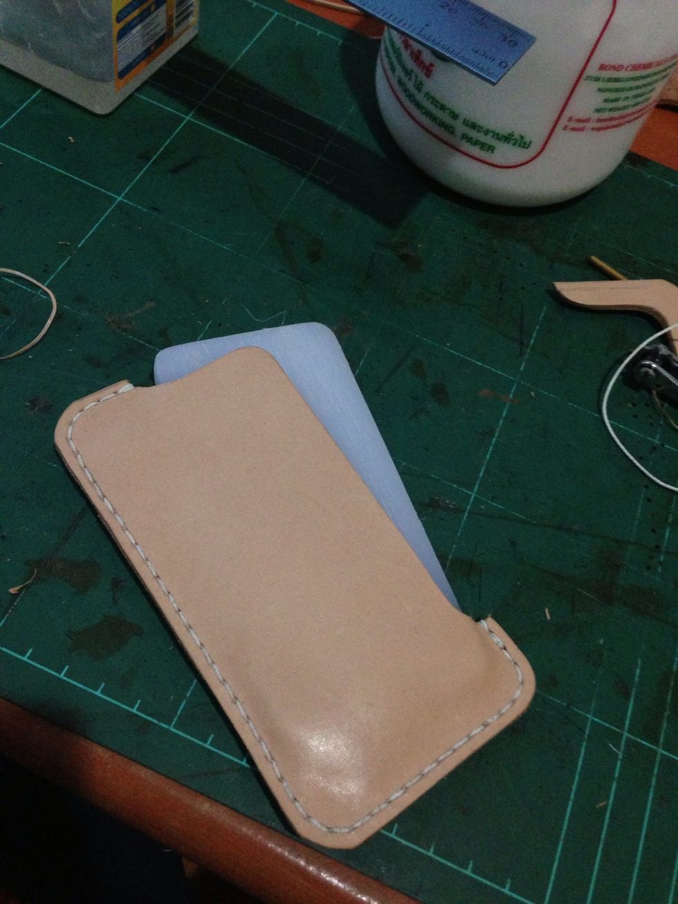 After it evenly moisten start inserting your plastic iphone 5, its little bit hard at the beginning, add more gun tragacanth to help the way in..